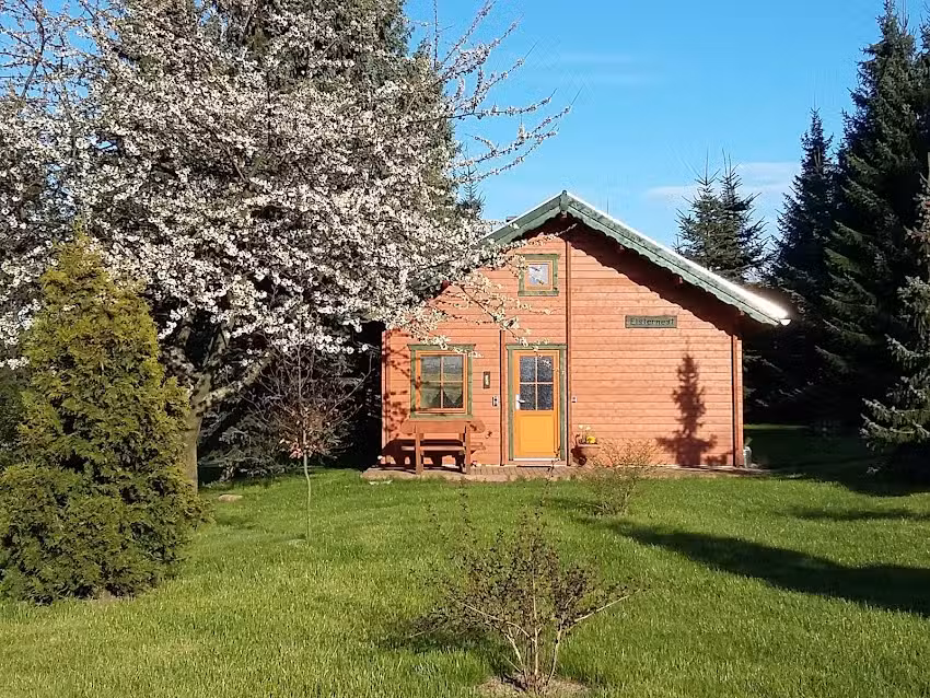 Blockhausgarten Ferienhausvermietung
