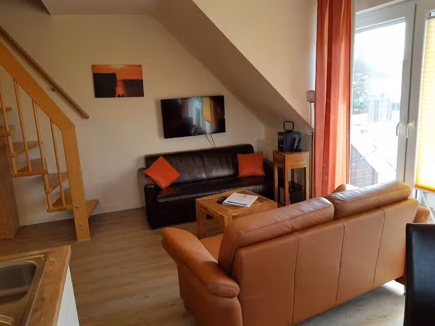 Feriendomizile Deichkrabbe – Ferienwohnungen und Ferienhaus am Deich und Hafen